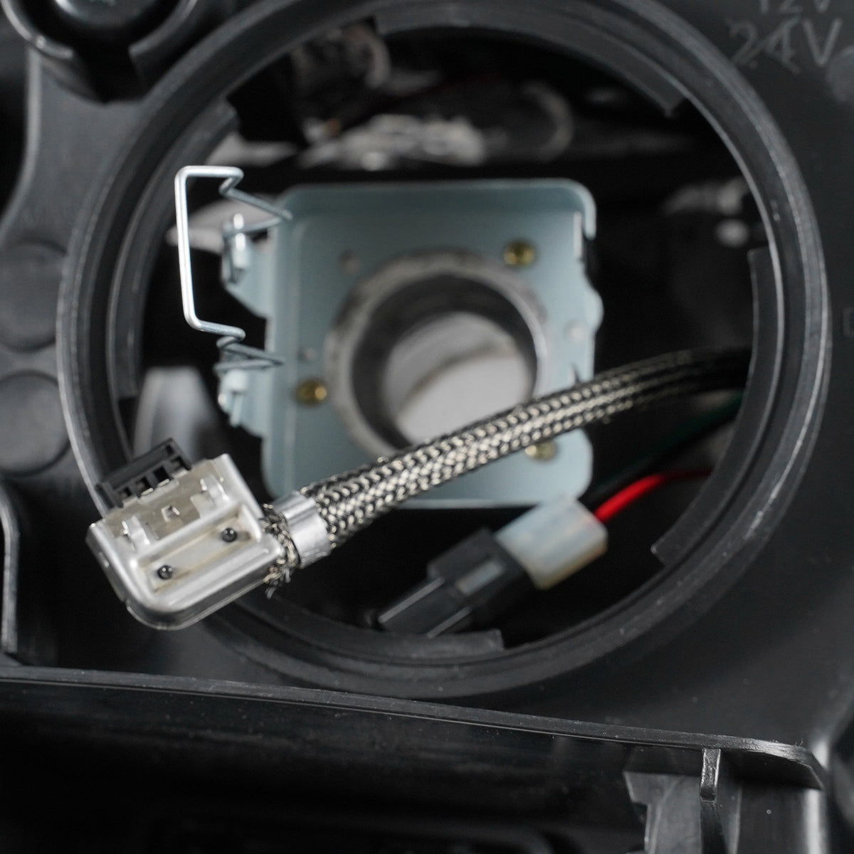 Hid headlight DOT marking close-up for 2014-2016 Jeep Grand Cherokee