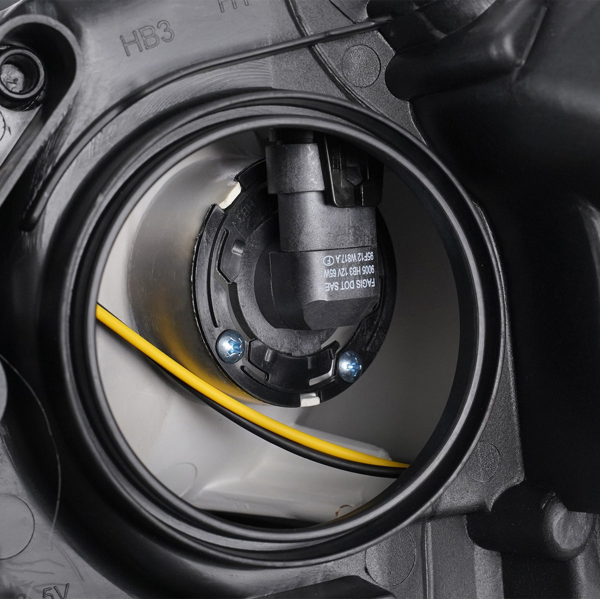 Halogen headlight inner detail close-up for 2013-2016 Ford Escape