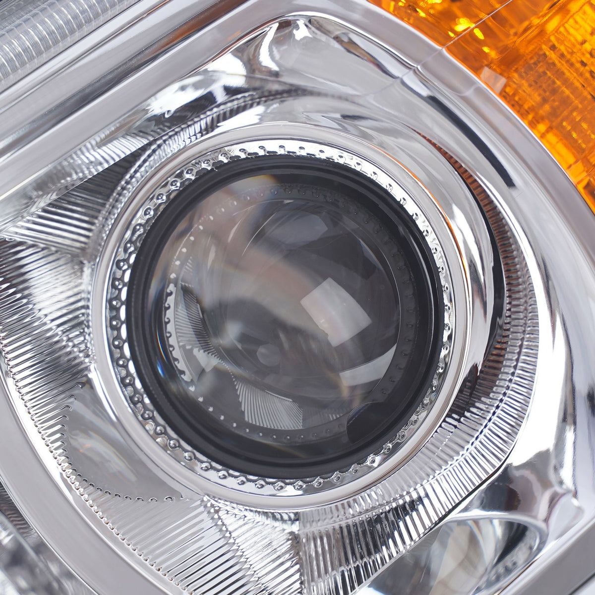 Halogen projector headlight DOT marking close-up for 2015-2022 GMC Canyon