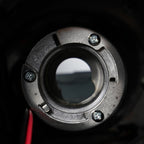 Halogen projector headlight DOT marking close-up for 2015-2019 GMC Sierra HD