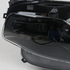 Hid headlight DOT marking close-up for 2014-2018 Jeep Cherokee