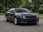 2014-2020 Chevy Impala with black HID projector headlights installed