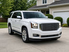 2015-2017 GMC Yukon with chrome halogen projector LED DRL headlights installed