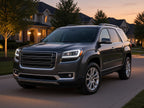 2013-2016 GMC Acadia with black halogen projector LED tube headlights installed