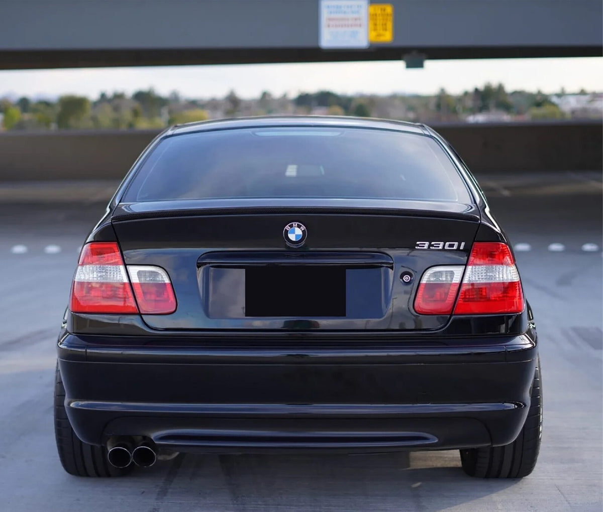 Euro red/clear tail lights installed on a 2002-2005 BMW E46 330i sedan