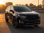 2015-2018 Ford Edge Sport with black halogen projector headlights installed