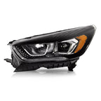 Passenger side Black Halogen headlight close-up for 2017-2019 Ford Escape
