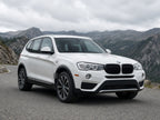 2015-2018 BMW X3 with black halogen projector headlights installed